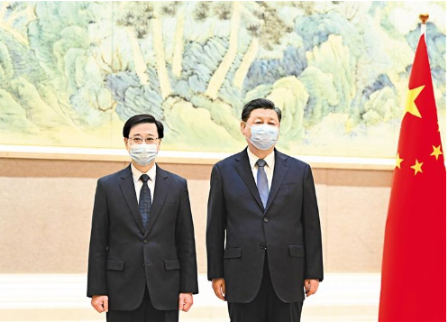 习近平会见李家超 